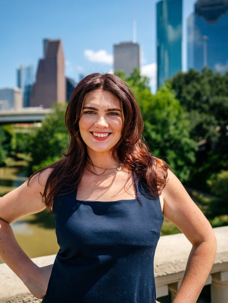McKenna Johnson with the Houston skyline behind her